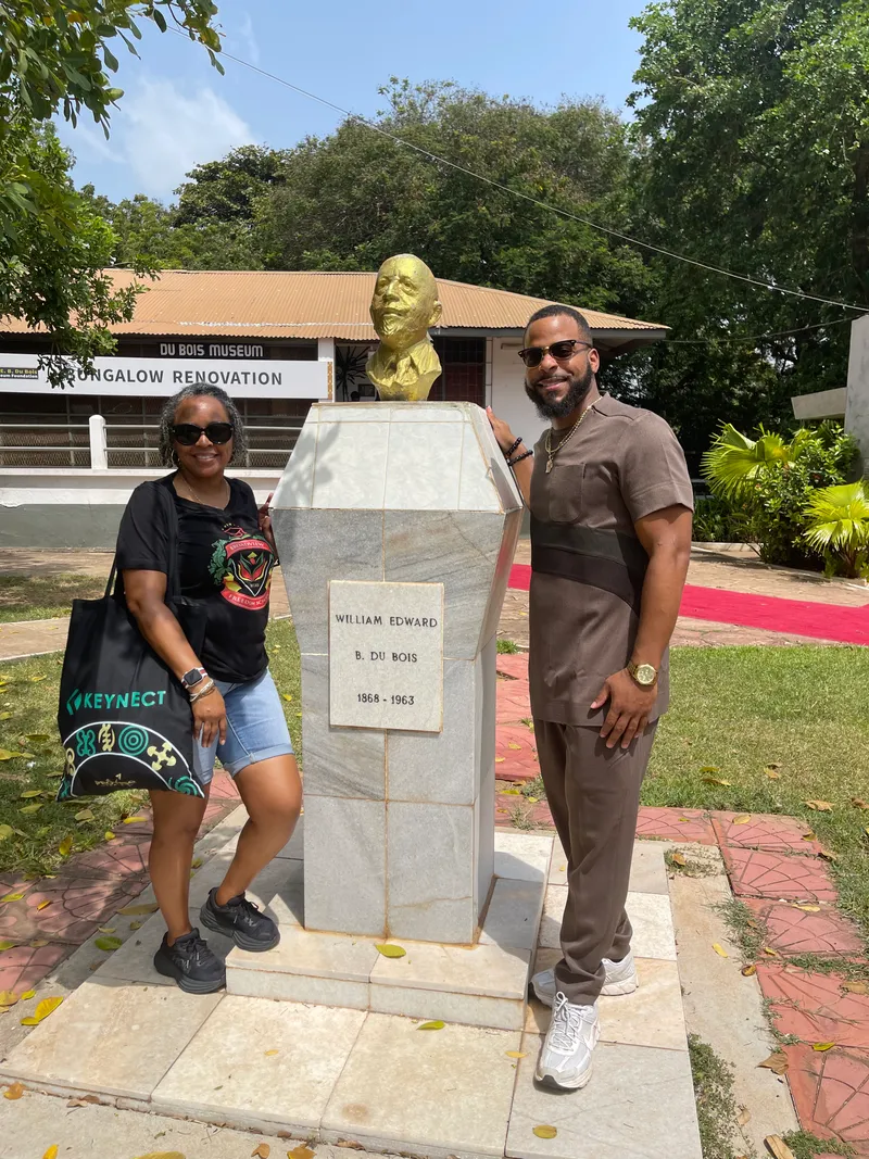 Miguel Jones with Katrina Thompson beside a bust of W. E. B. Du Bois